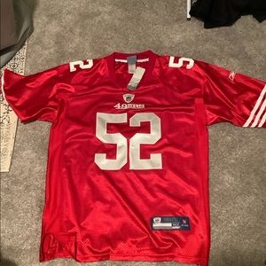 SF 49ers on field Patrick Willis red jersey